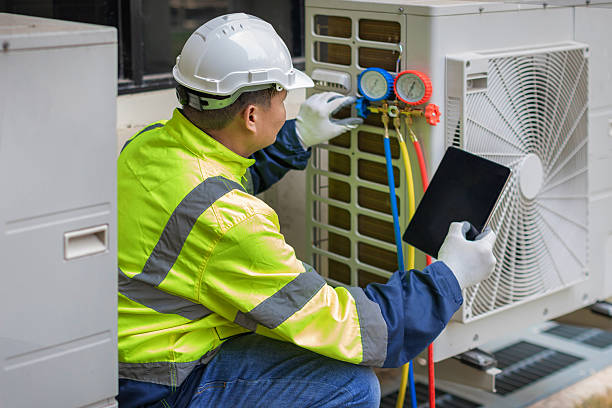 Professional Air Conditioning Repair technician working in Shelby, MI